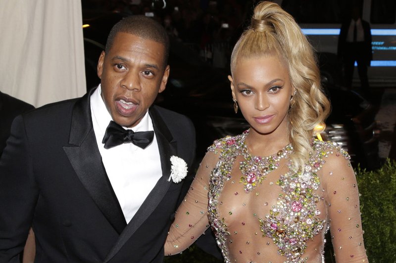 Beyonce and Jay Z (L) arrive on the red carpet at the Costume Institute Benefit at The Metropolitan Museum of Art celebrating the opening of China: Through the Looking Glass on May 4, 2015. Jay Z has gotten political by tackling the U.S. government's war on drugs, calling it an "epic fail" in a an op-ed for The New York Times. FIle Photo by John Angelillo/UPI