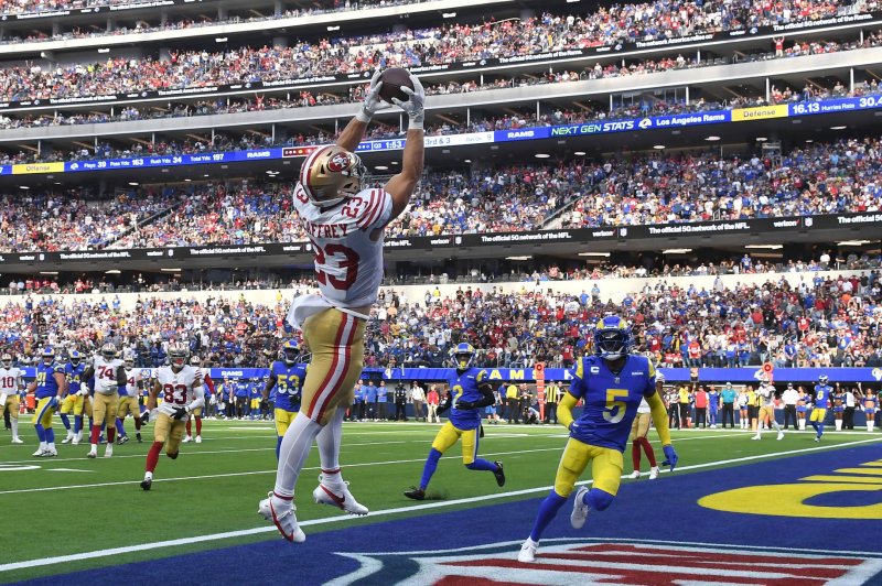 San Francisco 49ers running back Christian McCaffrey hauls in a touchdown pass against the Los Angeles Rams on Sunday at SoFi Stadium in Inglewood, Calif. Photo by Jon SooHoo/UPI