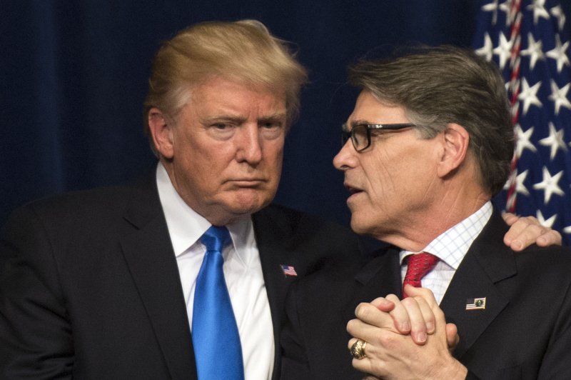 Efforts by President Donald Trump (L) and Energy Secretary Rick Perry to prop up traditional power sources in the United States may jeopardize strides made already for renewables, a trade group says. Photo by Kevin Dietsch/UPI