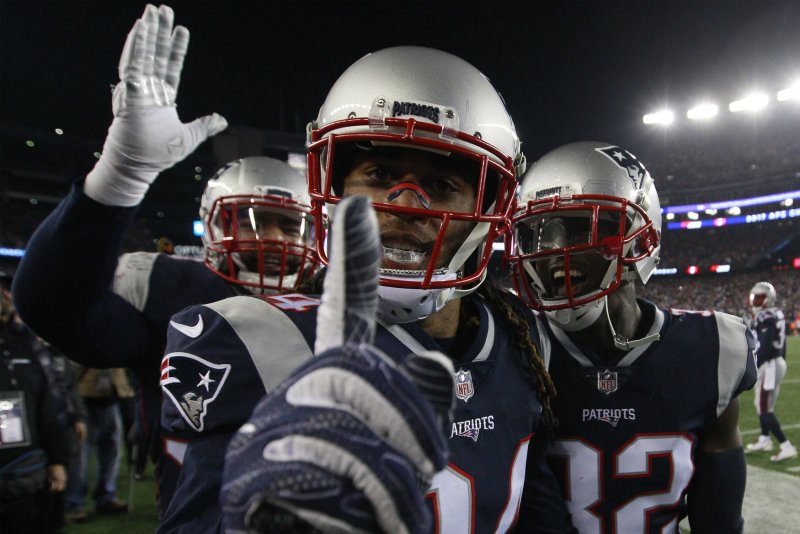 New England Patriots cornerback Stephon Gilmore (C) and Devin McCourty (R) celebrate 24-20 win over the Jacksonville Jaguars in the AFC Championship game at Gillette Stadium in Foxborough, Massachusetts on Sunday. Photo by Matthew Healey/ UPI | <a href="/News_Photos/lp/c46e405ed2fa1a1065cdfa04f7123a68/" target="_blank">License Photo</a>
