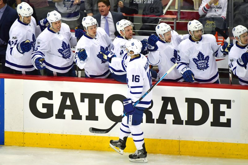 Toronto Maple Leafs forward Mitch Marner (16) celebrates with teammates after scoring against the Washington Capitals in the first period on April 13, 2017 at the Verizon Center in Washington, D.C. File photo by Kevin Dietsch/UPI