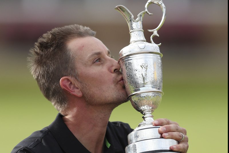 Swedish golfer Henrik Stenson kisses the claret jug after victory over American Phil Mickelson at the 145th Open Golf Championship in Troon, Scotland July 17, 2016. Photo by Hugo Philpott/UPI | <a href="/News_Photos/lp/5293874af3ab79fc01a01f292821b0c1/" target="_blank">License Photo</a>