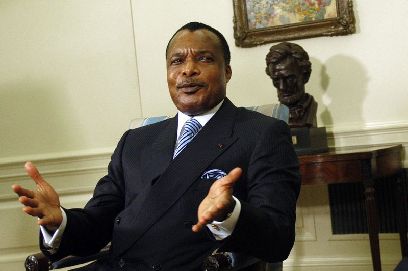 President of the Republic of Congo Denis Sassou Nguesso sits in the Oval Office of the White House on June 5, 2006. On Oct. 20, 2015, clashes erupted in the Congolese capital between security forces and demonstrators protesting an upcoming referendum that could change the constitution to allow Sassou Nguesso, 71, to run for a third term. POOL photo by Evan F. Sisley/UPI | <a href="/News_Photos/lp/31b773b502d42c4bfab33955064e6e34/" target="_blank">License Photo</a>