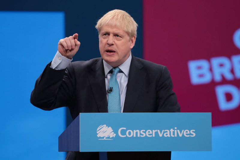 British Prime Minister Boris Johnson said he'd give Parliament more time to scrutinize his Brexit deal in exchange for the December election. Photo by Hugo Philpott/UPI