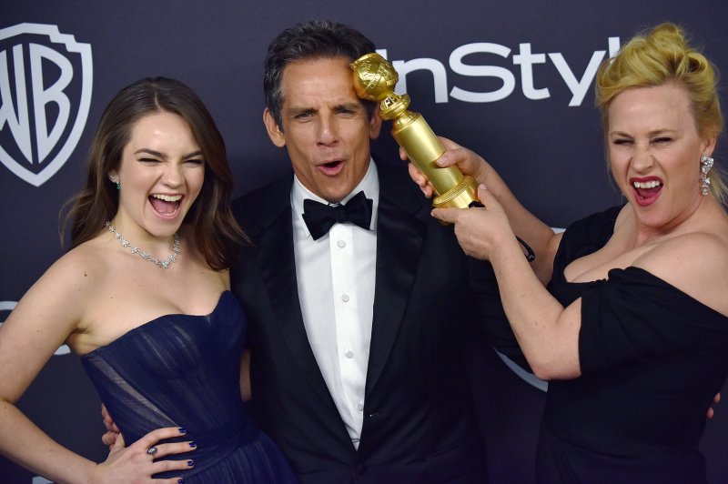 Left to right, Patricia Arquette, Ben Stiller and his daughter Ella Stiller clown around as they arrive at the 20th annual InStyle and Warner Brothers Golden Globes After-Party at the Beverly Hilton in Beverly Hills in 2019. This year's Globes gala is set to air on NBC Jan. 10. File Photo by Christine Chew/UPI | <a href="/News_Photos/lp/323a0599e38551c577a966c1d0f17026/" target="_blank">License Photo</a>