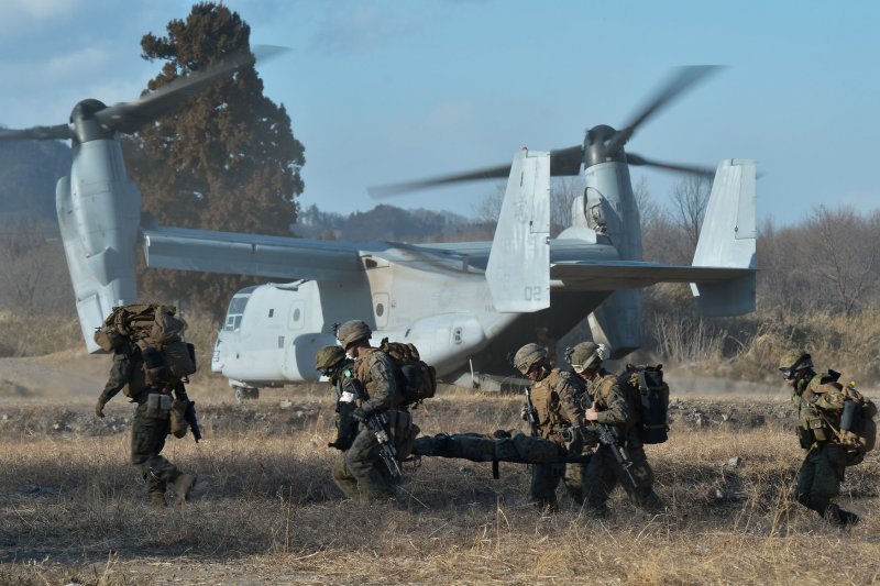 U.S. Marines and Japanese Ground Self-Defense Forces take part in casualty evacuation drills during joint military exercise "Forest Light 17" at Camp Soumagahara in Gunma prefecture, Japan, on March 10, 2017. Photo by Keizo Mori/UPI | <a href="/News_Photos/lp/17ff926d6d69b67baa03e60b1e8a6e5b/" target="_blank">License Photo</a>