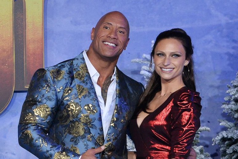 Dwayne Johnson (L) and his wife Lauren Hashian attend the premiere of "Jumanji: The Next Level" in December 2019. Johnson stars in the trailer for "Jungle Cruise" along with Emily Blunt. File Photo by Jim Ruymen/UPI