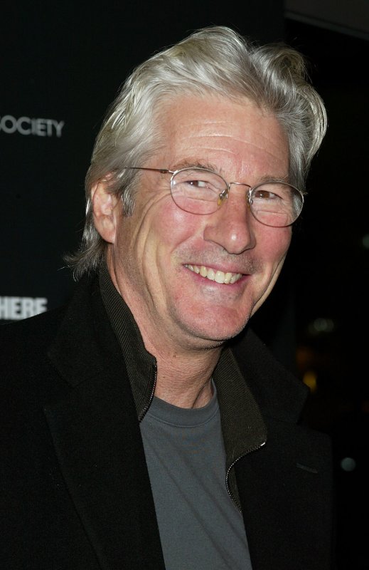 Richard Gere arrives for the premiere of "I'm Not There" at the Chelsea West Theater in New York on November 13, 2007. (UPI Photo/Laura Cavanaugh) | <a href="/News_Photos/lp/5ec2209286452a8f473d939059a57a1a/" target="_blank">License Photo</a>