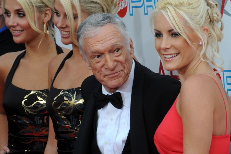 Identical twins Karissa and Kristina Shannon, Hugh Hefner and Crystal Harris (L-R) arrive for the 37th annual AFI Lifetime Achievement Awards honoring Douglas at Sony Pictures Studios in Culver City, California on June 11, 2009. (UPI Photo/Jim Ruymen)
