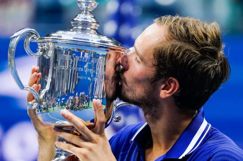 Daniil Medvedev of Russia holds the trophy after his win against Novak Djokavic of Serbia iin the 2021 U.S. Open men's singles final Sunday at the USTA Billie Jean King National Tennis Center in Forest Hills, N.Y. Photo by Corey Sipkin/UPI