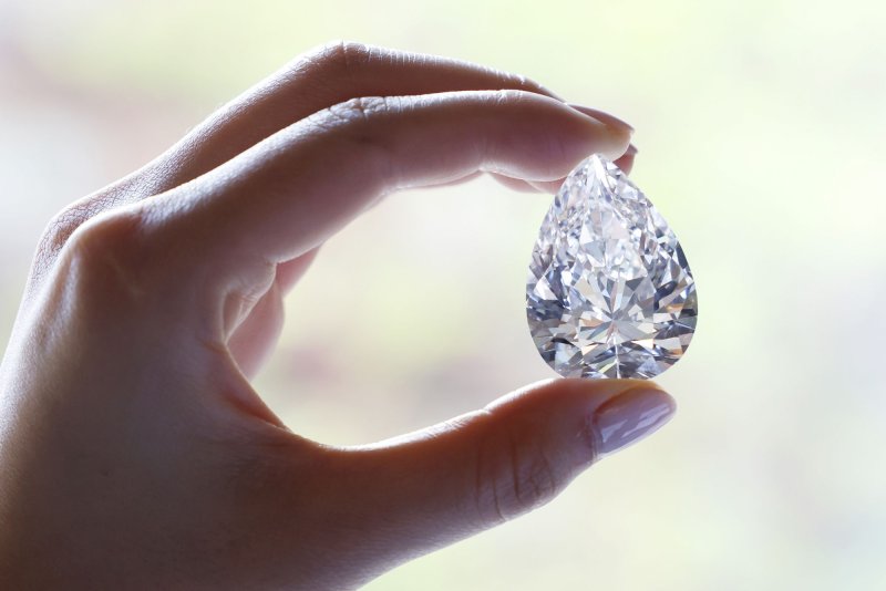 "The Juno" Diamond is held as one of two 100+ Carat Diamonds leading Sotheby's Magnificent Jewels auction at Sotheby's on Wednesday, June 8, 2022 in New York City. Photo by John Angelillo/UPI | <a href="/News_Photos/lp/7a8169ed1c481b78b6e33a48a976b66d/" target="_blank">License Photo</a>