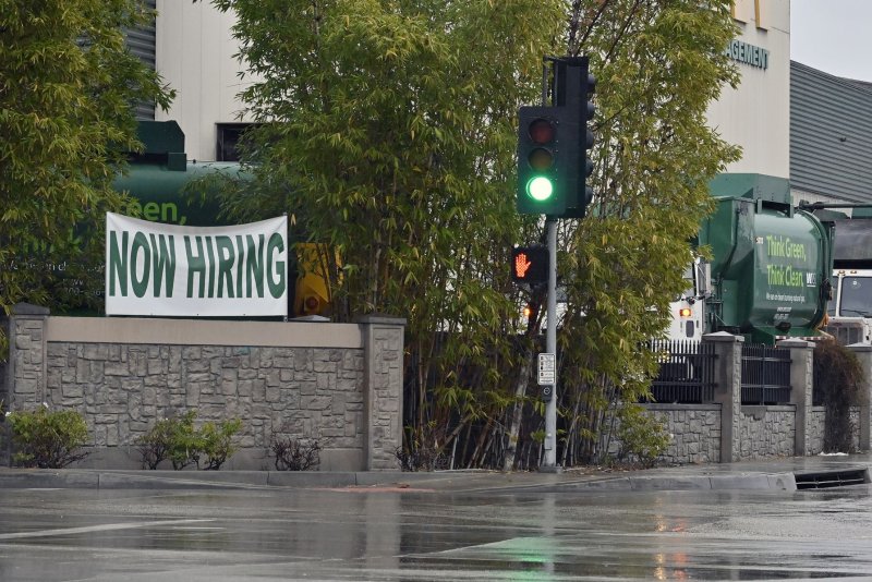 A now hiring banner is seen outside a waste management business in Irwindale, California. U.S. federal data show continued strength in employment. File Photo by Jim Ruymen/UPI | <a href="/News_Photos/lp/b4c35496c2aa2aba55f4b50c4a4fb5d5/" target="_blank">License Photo</a>