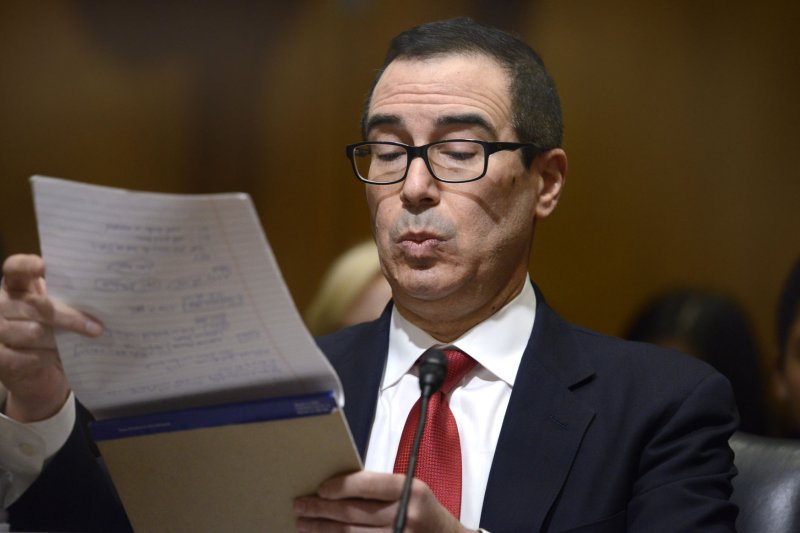 Treasury pick Mnuchin fights questions about tax shelters, 'foreclosure machine'