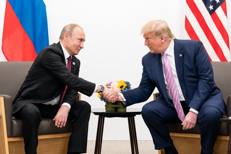A special counsel says the FBI should not have conducted its investigation into former President Donald Trump (pictured with Russian President Vladimir Putin in 2019) allegedly conspiring with Russia during the 2016 election. File Photo by Shealah Craighead/UPI