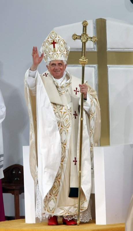 Pope Benedict XVI raises his after celebrating a mass at Yankee Stadium in New York City on April 20, 2008. (UPI Photo/John Angelillo) .