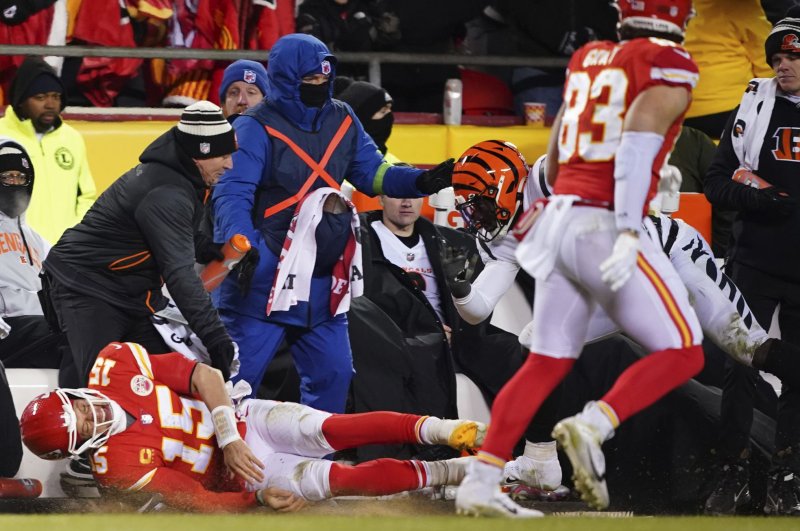 Cincinnati Bengals defensive end Joseph Ossai (C) was flagged for a late hit on Kansas City Chiefs quarterback Patrick Mahomes (L) in the fourth quarter of the AFC Championship game Sunday at GEHA Field at Arrowhead Stadium in Kansas City, Mo. Photo by Kyle Rivas/UPI