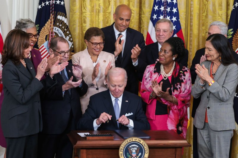 President Joe Biden signs an executive order to advance effective, accountable policing and strengthen public safety during an event at the White House on Wednesday. Photo by Oliver Contreras/UPI