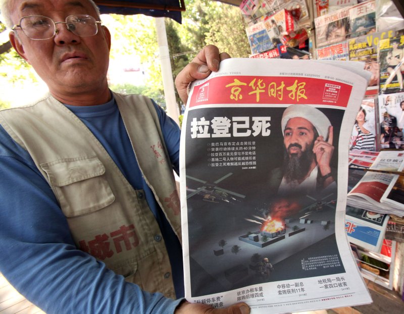 Newspapers featuring front page coverage of the killing of terrorist Osama bin Laden is sold in Beijing on May 3,, 2011. China called the killing of bin Laden a landmark event in the continuing fight against global terrorism and expressed support for close ally Pakistan amid suggestions Islamabad's security forces may have sheltered the world's most wanted man. UPI/Stephen Shaver