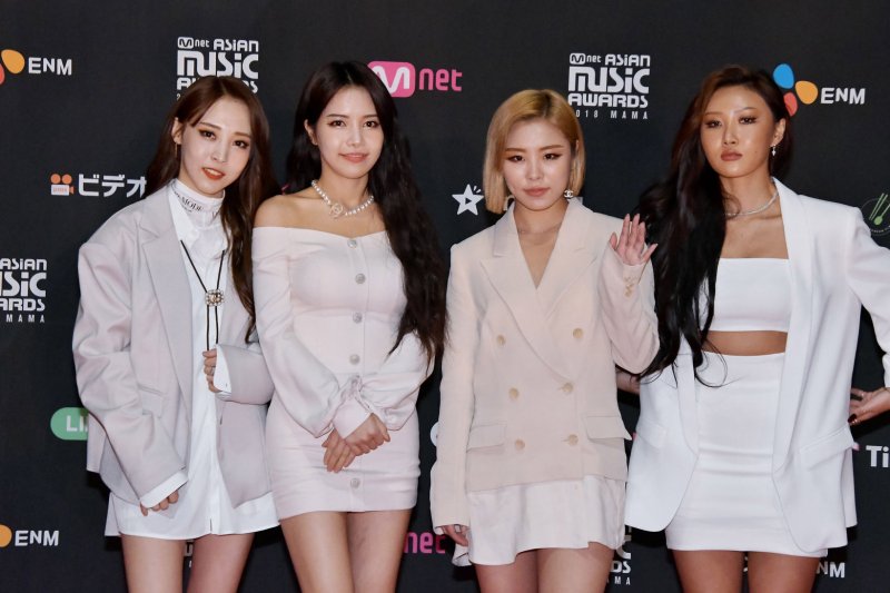 Moonbyul (L), pictured with Mamamoo, teased her music video for "Touchin &amp; Movin." File Photo by Keizo Mori/UPI