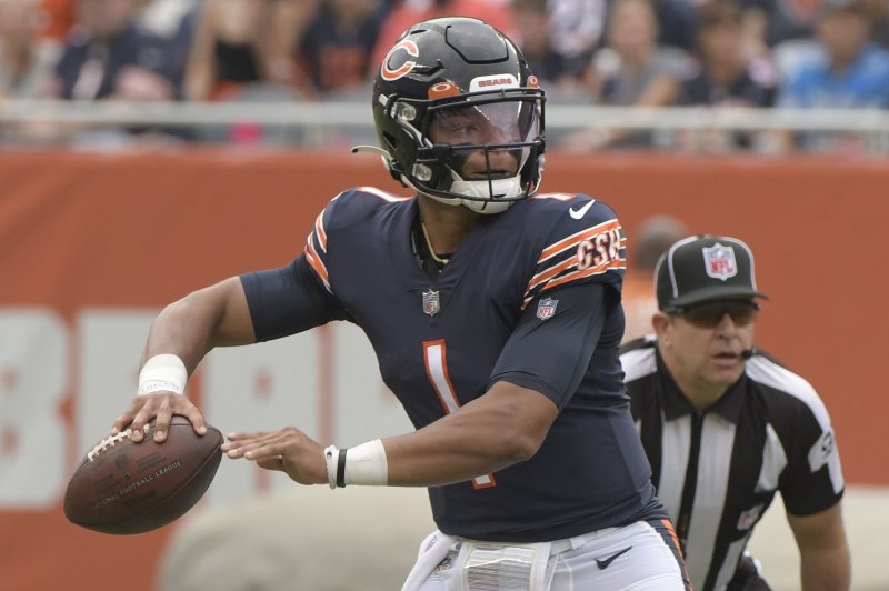 Chicago Bears quarterback Justin Fields looks for an open receiver against the Detroit Lions on Sunday at Soldier Field in Chicago. Photo by Mark Black/UPI