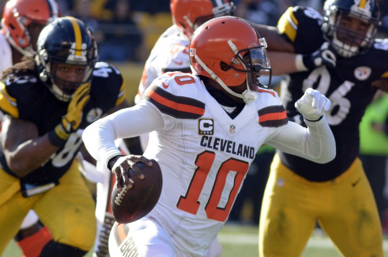 Former Cleveland Browns quarterback Robert Griffin III scrambles during a game against the Pittsburgh Steelers in January 2017. Photo by Archie Carpenter/UPI