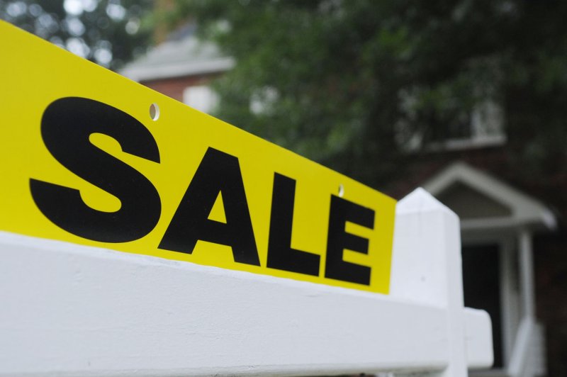 A sale sign is seen outside a home on the market in Arlington, Virginia on July 23, 2009. The Mortgage Bankers Association said Wednesday that applications dropped to their lowest point in more than 20 years. File Photo/Alexis C. Glenn/UPI | <a href="/News_Photos/lp/9fb4783bb32b5aefc2585d64ecff498b/" target="_blank">License Photo</a>