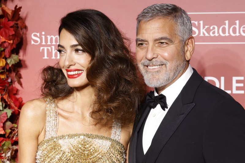 George Clooney (R) and Amal Clooney attend the Clooney Foundation for Justice inaugural Albie Awards on Thursday. Photo by John Angelillo/UPI | <a href="/News_Photos/lp/6a49ccac07c8461fea8f86681aec6c4e/" target="_blank">License Photo</a>