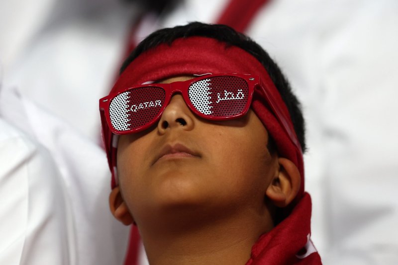 A Qatar fan looks on at the 2022 FIFA World Cup Group A match between Qatar and Ecuador on Sunday, before Qatar's 3-1 loss to Senegal on Friday, making it the first team to not advance in the tournament and fastest-ever host country to be eliminated from competition. Photo by Chris Brunskill/UPI