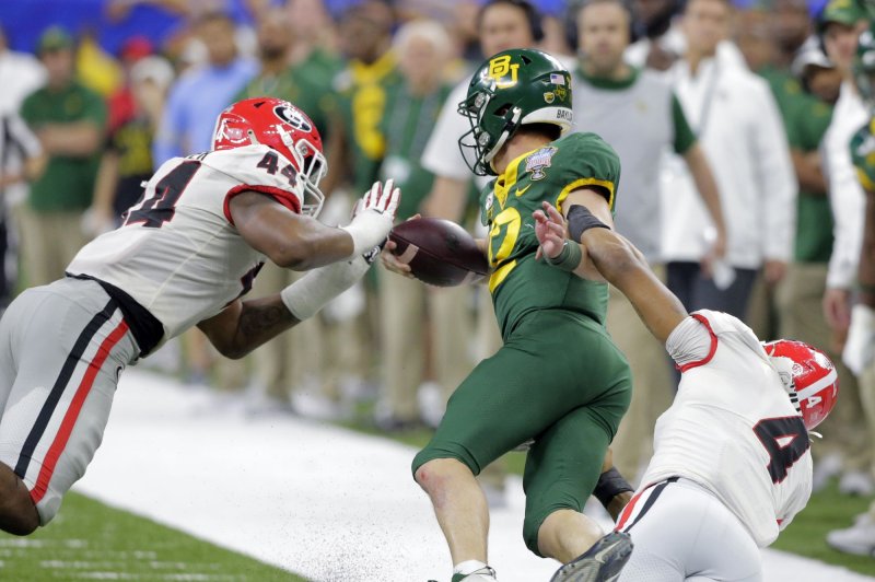 College football players underestimate concussion, injury risks
