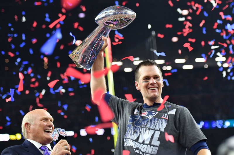 New England Patriots QB Tom Brady receives $14 million deferred signing bonus