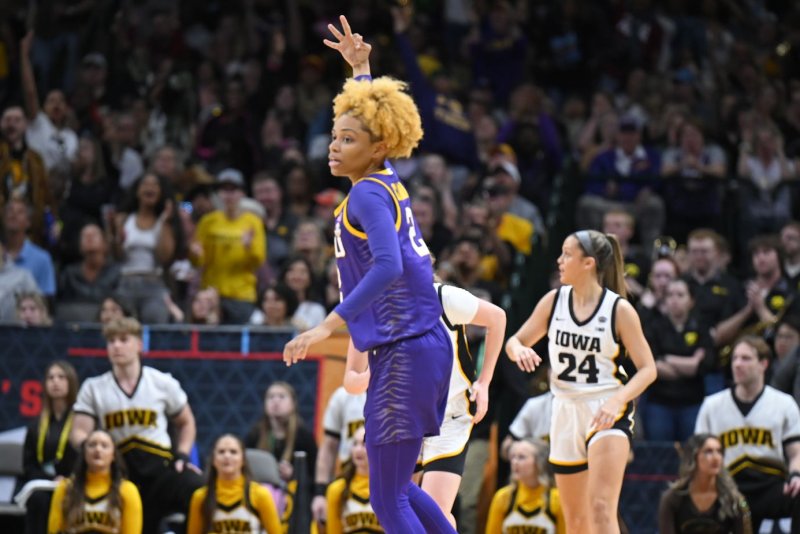 LSU Tigers guard Jasmine Carson celebrates a 3-point shot against the Iowa Hawkeyes at the 2023 NCAA Division I women's basketball tournament finale Sunday at the American Airlines Center in Dallas. Photo by Ian Halperin/UPI