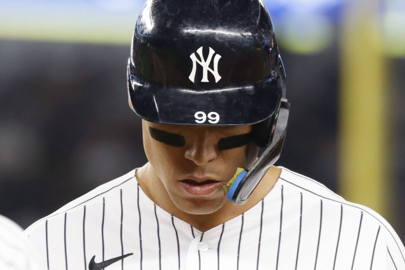 New York Yankees outfielder Aaron Judge stands near first base after walking in the third inning against the Boston Red Sox on Sunday at Yankee Stadium in New York. Photo by John Angelillo/UPI | <a href="/News_Photos/lp/bb9189765cf346686b217183310ce5a6/" target="_blank">License Photo</a>