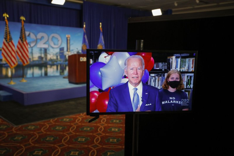 Democratic presidential nominee and former Vice President Joe Biden is seen on a screen during the second night of the 2020 Democratic National Convention at the Wisconsin Center in Milwaukee, Wis., on August 18. Photo by Brian Snyder/UPI/Pool | <a href="/News_Photos/lp/6316cc1738d08cf5cd25236066504b17/" target="_blank">License Photo</a>