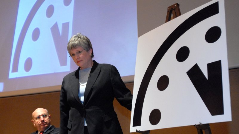 The Bulletin of the Atomic Scientists, represented by Thomas Pickering and Kennette Benedict (l to r) moved the minute hand of the Doomsday Clock two minutes closer to midnight, now set to 5 minutes to midnight, during a news conference in Washington on January 17, 2007. The group of scientists and Nobel Laureates used the occasion to warn of failures to deal with nuclear proliferation and global climate change. (UPI Photo/Roger L. Wollenberg)