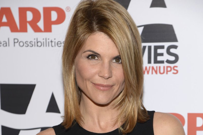 Lori Loughlin shares throwback pic of herself and John Stamos before 'Full House'