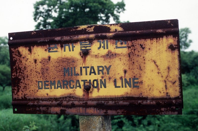 This undated Department of Defense photo shows a sign in the Demarcation Line (MDL) separating North and South Korea. On Monday, May 25, 2009 North Korea allegedly detonated a nuclear device during an underground test and test fired several short range missile. North Korea announced that it has restarted its nuclear weapons research program. (UPI Photo/Scott Stewart/USAF)