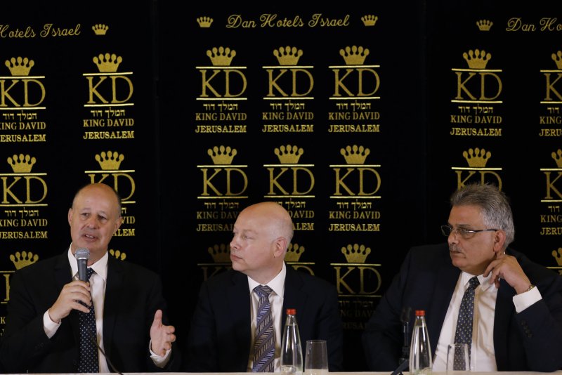 Jason Greenblatt (C), U.S. envoy to the Middle East, sits next to Israeli Minister of Regional Cooperation Tzachi Hanegbi (L) and Palestinian Water Authority head Mazen Ghoneim during a news conference to announce an water agreement in Jerusalem on Thursday. The deal will see Israel sell 32 million cubic meters of water per year to the Gaza Strip and West Bank, while also helping stem the shrinking Dead Sea. Pool Photo by Ronen Zvulun/UPI | <a href="/News_Photos/lp/27e20bead34e79844dda53d530fb20d3/" target="_blank">License Photo</a>