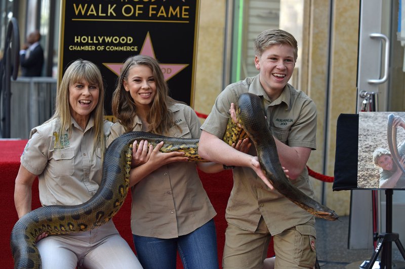 Bindi Irwin (C) and Robert Irwin (R), pictured with Terri Irwin, will appear as guest judges in "RuPaul's Drag Race Down Under" Season 2. File Photo by Chris Chew/UPI | <a href="/News_Photos/lp/9a127279179bbca934000f02e990b702/" target="_blank">License Photo</a>