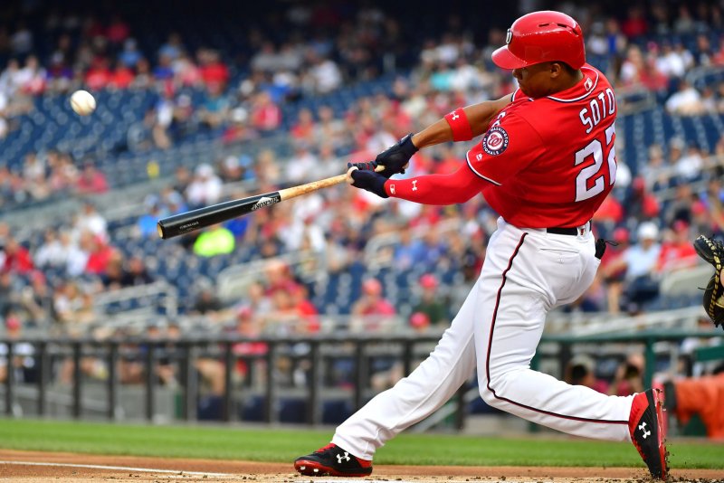Washington Nationals right fielder Juan Soto (22) connects for a two-run home run against the New York Yankees in the seventh inning Monday at Nationals Park in Washington, D.C. Photo by Kevin Dietsch/UPI