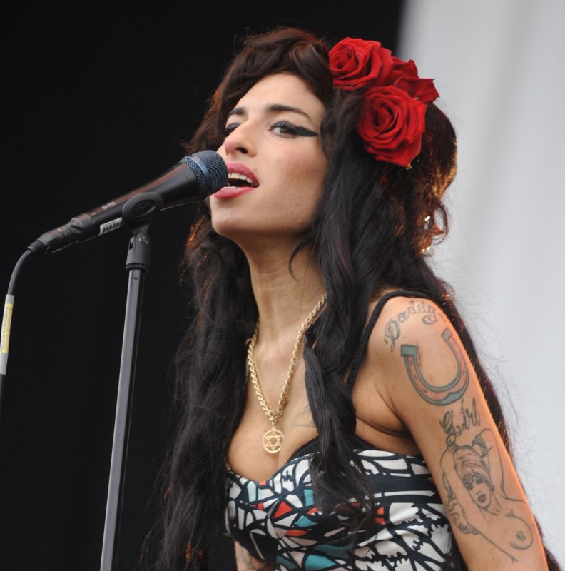 British singer Amy Winehouse performs at V Festival in Hylands Park in Chelmsford on August 17, 2008. (UPI Photo/Rune Hellestad)