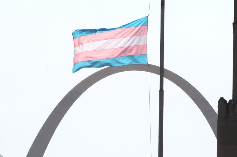 A transgender flag flys near St. Louis City Hall with the Gateway Arch in the background on June 20, 2016. Saturday marks Transgender Remembrance Day. File Photo by Bill Greenblatt/UPI | <a href="/News_Photos/lp/9447616ebf74b984a19c2ba200c6f729/" target="_blank">License Photo</a>