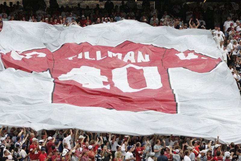 During halftime between the New England Patriots and the Arizona Cardinals, a large banner is displayed with the number of Corporal Pat Tillman in 2004 in Tempe, Ariz. File photo by Will Powers/UPI