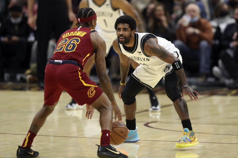 Brooklyn Nets guard Kyrie Irving (R) tweeted a link last week on Twitter to an anti-Semitic film. File Photo by Aaron Josefczyk/UPI | <a href="/News_Photos/lp/feb4dc4fdf7ef9b6c3e94a23783fc04f/" target="_blank">License Photo</a>