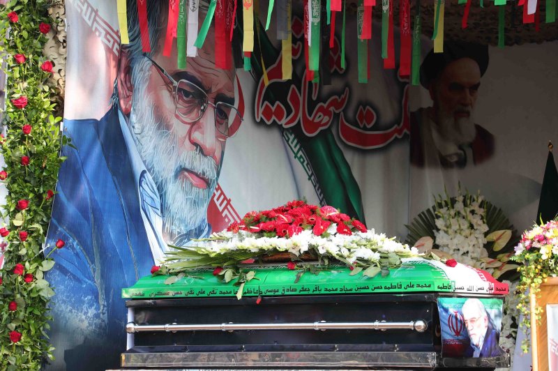 The coffin of slain Iranian nuclear scientist Mohsen Fakhrizadeh is shown during a funeral procession inside the Iranian Defense Ministry in Tehran Monday. Photo by Iranian Defense Ministry/UPI
