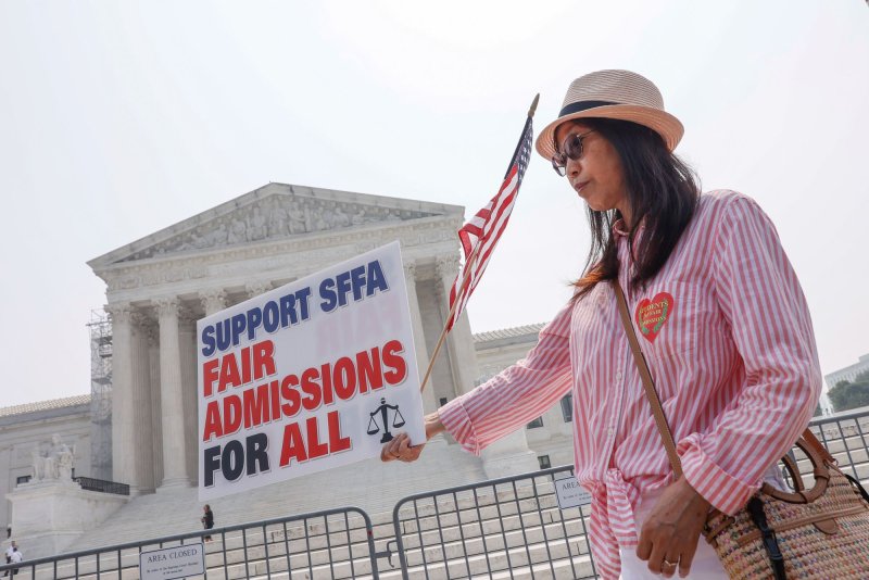 A member of Students For Fair Admissions protest outside the U.S. Supreme Court to protest affirmative action in college admissions on June 29 in Washington. Photo by Jemal Countess/UPI