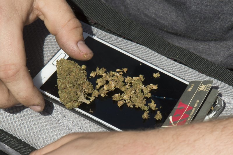 Police in the Danish capital said they arrested a man who was found to be carrying 1,000 joints after he climbed into the back of a police car that he mistook for a taxi. File Photo by Terry Schmitt/UPI | <a href="/News_Photos/lp/eaad2047122657575cb6346919f147d0/" target="_blank">License Photo</a>