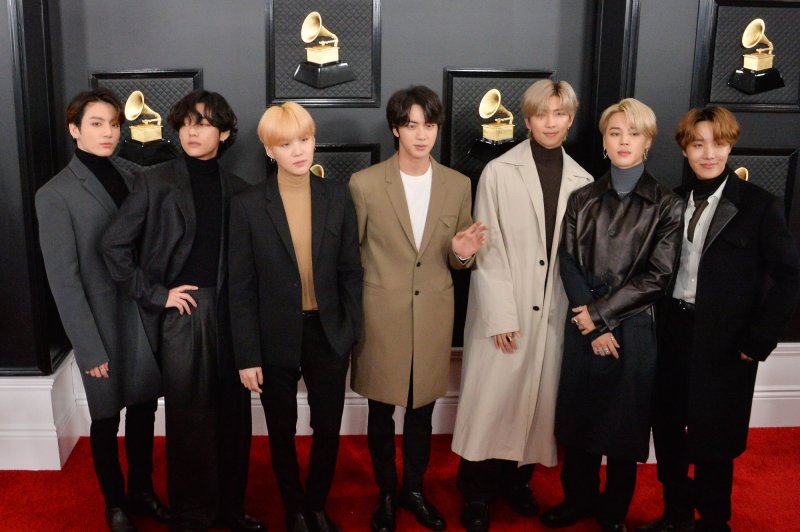 From left to right, BTS members RM, V, Suga, Jin, Jimin, Jungkook and J-Hope arrive for Grammy Awards in January 2020. File Photo by Jim Ruymen/UPI
