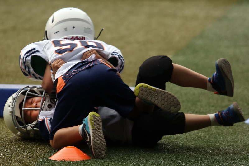 Study: No link between head impacts in youth football and brain, behavior issues