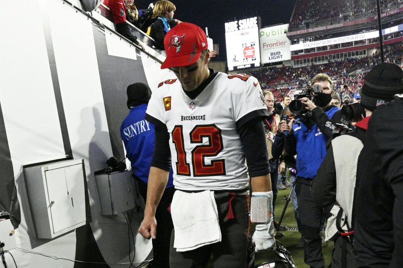 Tampa Bay Buccaneers quarterback Tom Brady (12) leaves the field after a 30-27 loss to the Los Angeles Rams during the NFC Divisional Round on Sunday at Raymond James Stadium in Tampa, Fla. Photo by Steve Nesius/UPI