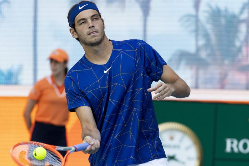 Taylor Fritz (pictured) will face fellow American Tommy Paul or Spaniard Carlos Alcaraz in a Miami Open quarterfinal Wednesday in Miami Gardens, Fla. File Photo by Gary I Rothstein/UPI